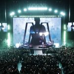 overview image of a packed stadium as depeche mode performs